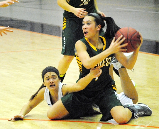 Marshfield's Caitlin Michaelis fights for the ball with D.C. Everest's Hannah Tipple during Friday's girls basketball game at Marshfield High School. (Photo by Paul Lecker/MarshfieldAreaSports.com)