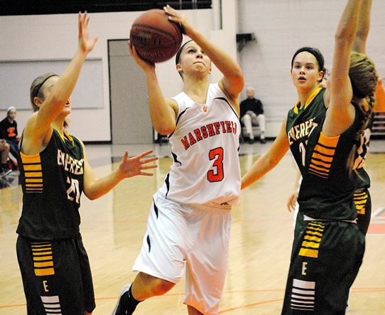 Marshfield's Tiffany Stargardt drives to the basket during the Tigers' game against D.C. Everest on Friday at Marshfield High School. (Photo by Paul Lecker/MarshfieldAreaSports.com)