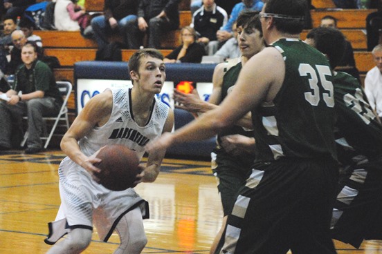 Columbus Catholic senior Evan Nikolai, left, and the Dons head into the WIAA playoffs with a 19-3 record and a No. 2 seed. (Photo by Paul Lecker/MarshfieldAreaSports.com)