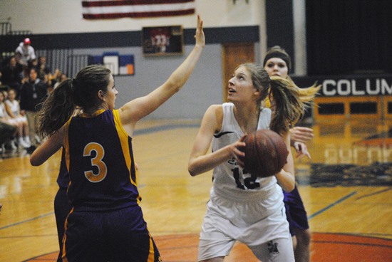 Columbus Catholic's Kendra Baierl eyes the basket during the first half of the Dons' WIAA Division 5 playoff win over Pittsville on Tuesday at Columbus Catholic High School. (Photo by Paul Lecker/MarshfieldAreaSports.com)