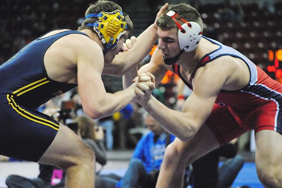 Spencer/Columbus' Hunter Luepke, right, does battle with Tomahawk's Kaleb Kaminski during a Division 2 182-pound quarterfinal match on Friday at the WIAA State Individual Wrestling Tournament at the Kohl Center in Madison. Luepke lost the match 3-2, but came back to win a consolation match and guarantee himself a medal at the state meet. (Photo by Paul Lecker/MarshfieldAreaSports.com)