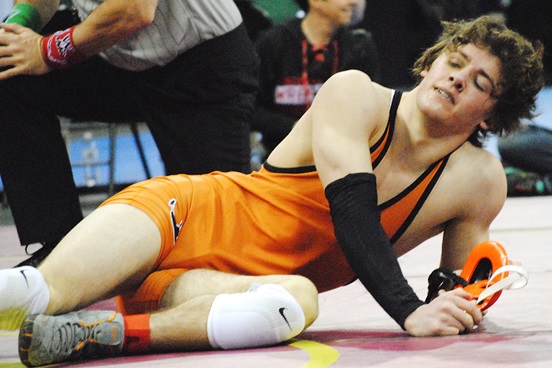 Stratford's Mason Kauffman lies exhausted after pulling out an improbable last-second victory over Dustin Reynolds of Lancaster in a Division 3 152-pound quarterfinal at the WIAA State Individual Wrestling Tournament on Friday afternoon. Kauffman will wrestle in the semifinals Friday night. (Photo by Paul Lecker/MarshfieldAreaSports.com)