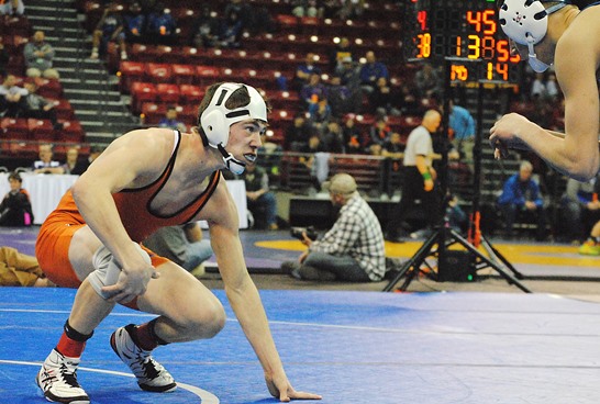 Stratford's Sam Wenzel gets ready to engage Johnson Creek's Adam Becker during a 138-pound Division 3 preliminary match at the WIAA State Individual Wrestling Tournament in Madison on Thursday night. Wenzel won 3-2. (Photo by Paul Lecker/MarshfieldAreaSports.com)