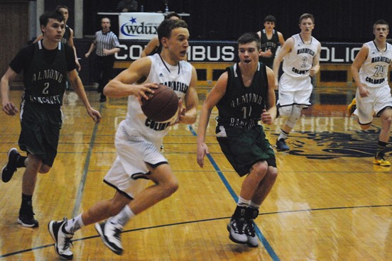 Columbus Catholic's Tyler Fuerlinger, left, was a first-team pick to this year's All-Cloverbelt Conference East Division boys basketball team after leading the Dons in scoring. (Photo by Paul Lecker/MarshfieldAreaSports.com)