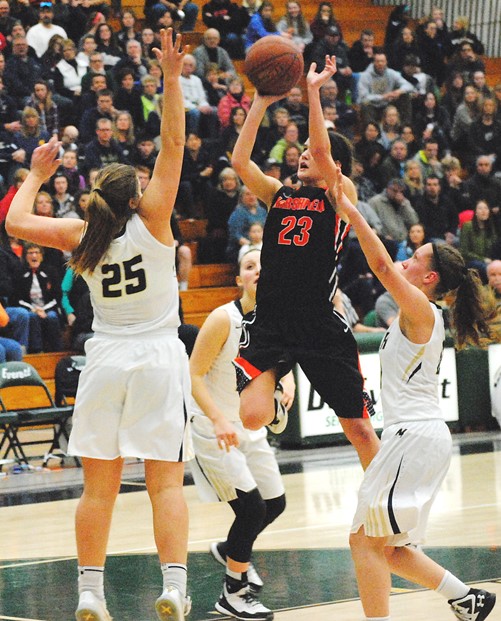 Marshfield's Maddie Nikolai drives in for a shot attempt during the Tigers' loss to Appleton North on Saturday in a WIAA Division 1 sectional final at D.C. Everest High School. (Photo by Paul Lecker/MarshfieldAreaSports.com)