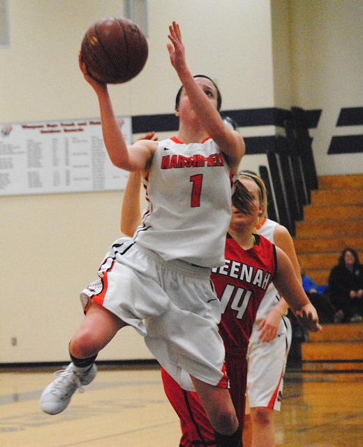 Marshfield senior guard McKayla Scheuer pushes in for a shot during the Tigers' 74-71 overtime win over Neenah in a WIAA Division 1 sectional semifinal Thursday night at Waupaca High School. (Photo by Paul Lecker/MarshfieldAreaSports.com)