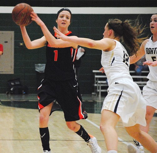 Marshfield's McKayla Scheuer searches for an open teammate during the Tigers' WIAA Division 1 sectional final against Appleton North on Saturday at D.C. Everest High School. The Tigers lost 56-54. (Photo by Paul Lecker/MarshfieldAreaSports.com)