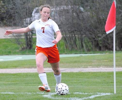 Marshfield's Maureen Cassidy boots a corner kick during the first half of the Tigers' game against Wausau East on Tuesday at Griese Park. (Photo by Paul Lecker/MarshfieldAreaSports.com)