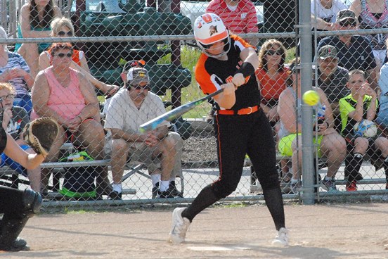 Marshfield's Megan Donahue ripped her 12th home run of the season on this pitch in the fourth inning of the Tigers' 10-0 win over New Richmond in a WIAA Division 1 softball regional semifinal Tuesday at the Marshfield Fairgrounds. (Photo by Paul Lecker/MarshfieldAreaSports.com)