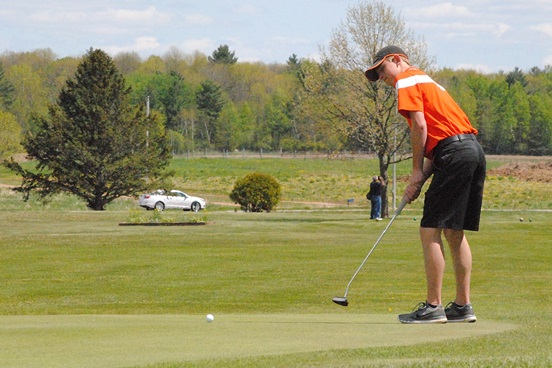 Marshfield's Zach Hanson hits a putt on the par-3 fifth hole during the Wisconsin Valley Conference Boys Golf Meet on Tuesday at RiverEdge Golf Course in Marshfield. The Tigers finished fourth. (Photo by Paul Lecker/MarshfieldAreaSports.com)