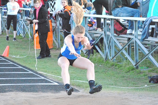 Auburndale's Sylviann Momont uncorks a triple jump of 33 feet, 4 inches to win the event at the Marawood Conference South Division Track & Field Meet on Monday at Tiger Stadium in Stratford. (Photo by Paul Lecker/MarshfieldAreaSports.com)