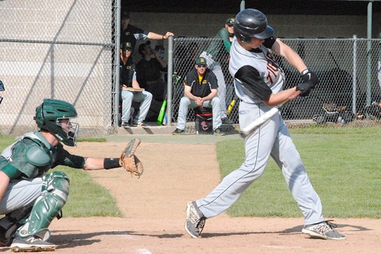 Marshfield's Trevor Schwecke takes a swing at a pitch during the Tigers' game against D.C. Everest on Thursday at Jack Hackman Field in Marshfield. The Tigers lost 11-9 in nine innings. (Photo by Paul Lecker/MarshfieldAreaSports.com)