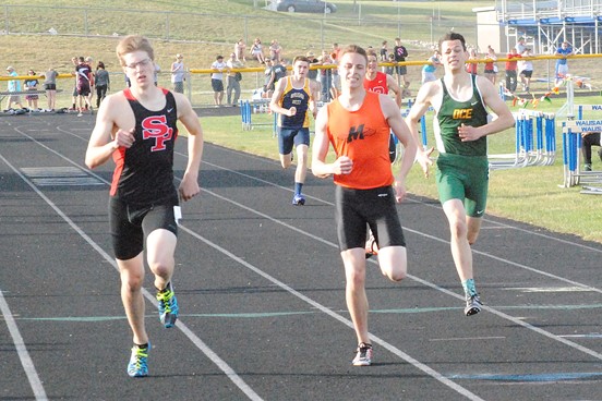Marshfield's Calden Wojt, middle, finished third in the 100 meters at the WIAA Division 1 Track & Field Regional at Wausau West High School on Monday. (Photo by Paul Lecker/MarshfieldAreaSports.com)