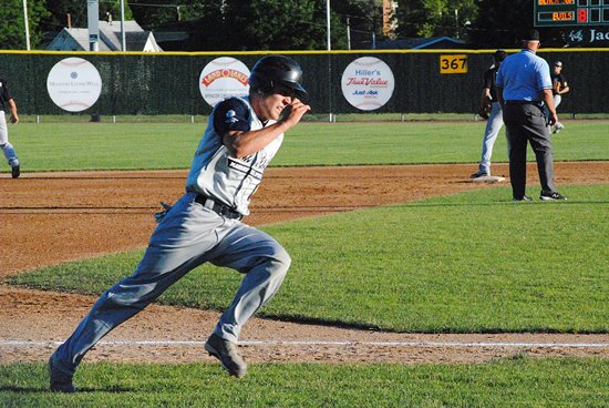 Marshfield Post 54's Braden Bohman flies around third base to score the ninth run of a big first inning as the Blue Devils' cruised to a 20-7 win over Plover in Legion baseball action Tuesday at Jack Hackman Field in Marshfield. (Photo by Paul Lecker/MarshfieldAreaSports.com)
