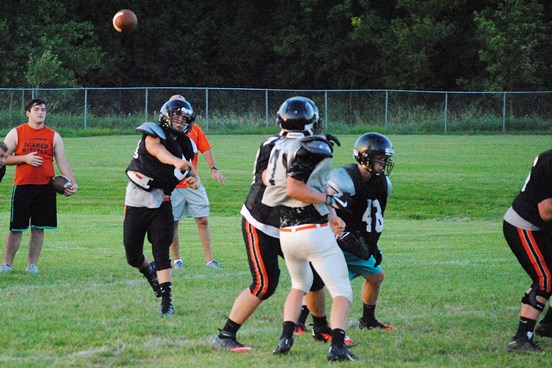 Marshfield quarterback Jared Johnsrud throws a pass during Tuesday's practice at Marshfield High School. (Photo by Paul Lecker/MarshfieldAreaSports.com)