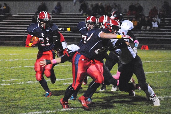 Noah Zastrow (21) is one of two returning 1,000-yard rushers for the Spencer/Columbus Catholic football team. (Photo by Paul Lecker/MarshfieldAreaSports.com)