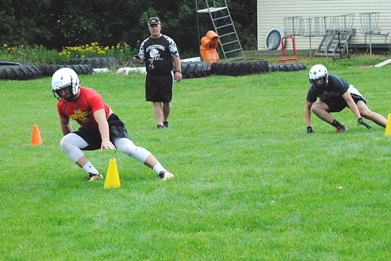 Stratford senior Kam Bornbach, front, takes part in a speed drill during the Tigers' first practice Tuesday morning at Stratford High School. (Photo by Paul Lecker/MarshfieldAreaSports.com)