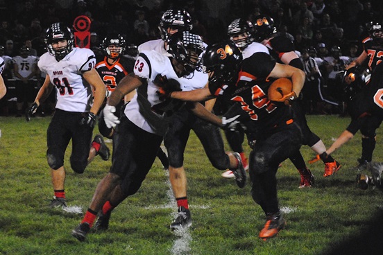 Marshfield running back Braden Bohman stiff arms Stevens Point defensive back Keon'te Williams to gain some extra yardage during Friday's football game at Beell Stadium in Marshfield. Point won 42-0. (Photo by Paul Lecker/MarshfieldAreaSports.com)