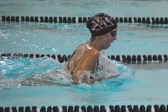 Marshfield senior Elizabeth Holbrook competes in the breaststroke during the 200-yard medley relay Tuesday during a dual meet with Stevens Point at Marshfield High School. (Photo by Paul Lecker/MarshfieldAreaSports.com)