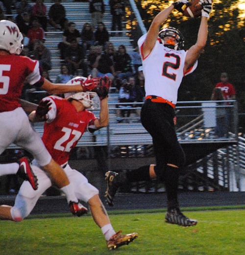 Marshfield wide receiver Nathan McGrath hauls in a pass from Ryan Krueger that turned into a 42-yard touchdown during the first quarter of Friday's game at Wisconsin Rapids. The Tigers lost 21-14. (Photo by Paul Lecker/MarshfieldAreaSports.com)