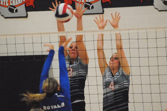 Stratford's Makayla Krall, left, and Blaire Lindner go up for a block during the Tigers' match against Wisconsin Rapids Assumption on Tuesday at Stratford High School. The Tigers won 3-0. (Photo by Paul Lecker/MarshfieldAreaSports.com)