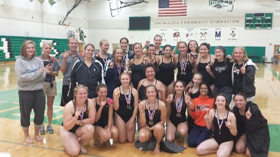 The Marshfield girls swim team celebrates its victory at the Hodag Relays on Saturday at Rhinelander High School. (Submitted photo)