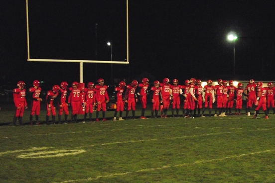 The Spencer/Columbus football team lines up for introductions prior to its game against Bonduel on Friday night at Spencer High School. (Photo by Steve Pilz/For MarshfieldAreaSports.com)