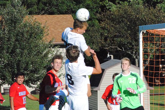 Marshfield Columbus Catholic senior Tyler Fuerlinger, with the header, was chosen as the Mid-State Soccer Conference Player of the Year and was one of five Dons picked to the first team of the all-conference squad. (Photo by Paul Lecker/MarshfieldAreaSports.com)