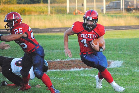 Spencer/Columbus junior Hunter Luepke carries the ball during a game earlier this season against Stanley-Boyd. Luepke was named to the All-North Central Region football team at both running back and inside linebacker by the Wisconsin Football Coaches Association. (Photo by Paul Lecker/MarshfieldAreaSports.com)