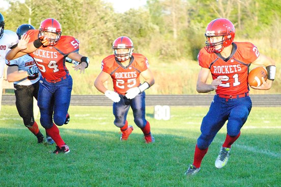 Spencer/Columbus Catholic running back Noah Zastrow (21) was named 2016 Cloverbelt Conference co-offensive player of the year. (Photo by Paul Lecker/MarshfieldAreaSports.com)